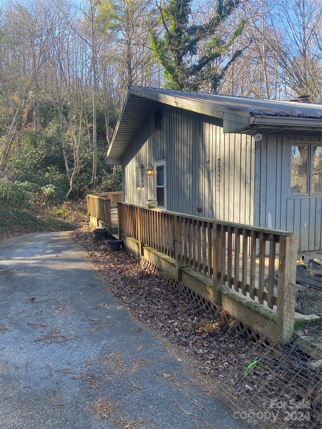 view of home's exterior featuring a deck