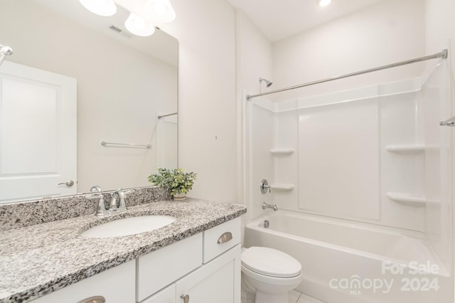 full bathroom with shower / bathing tub combination, vanity, and toilet