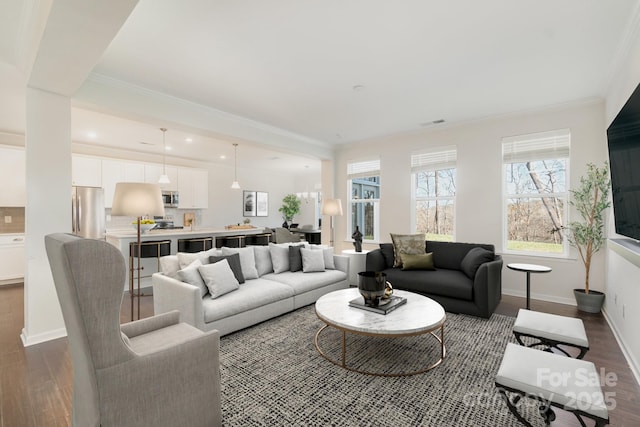 living room with crown molding and dark wood-type flooring