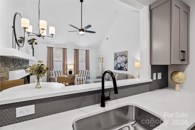 20 Heartleaf Cir Lot 7, Arden, NC 28704 - kitchen featuring gray cabinetry, ceiling fan, open floor plan, high vaulted ceiling, and light stone countertops