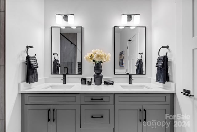 20 Heartleaf Cir Lot 7, Arden, NC 28704 - bathroom featuring a tile shower and double vanity