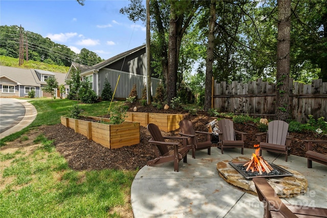 20 Heartleaf Cir Lot 7, Arden, NC 28704 - view of patio featuring an outdoor fire pit