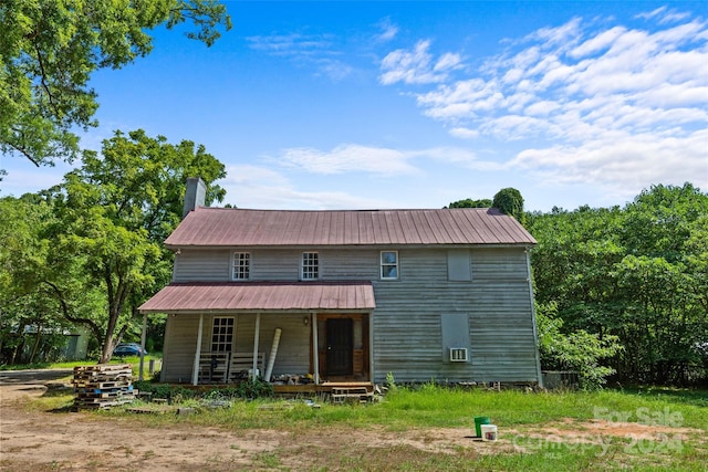 view of front of property featuring covered porch