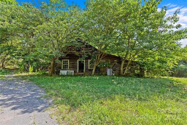 view of log cabin