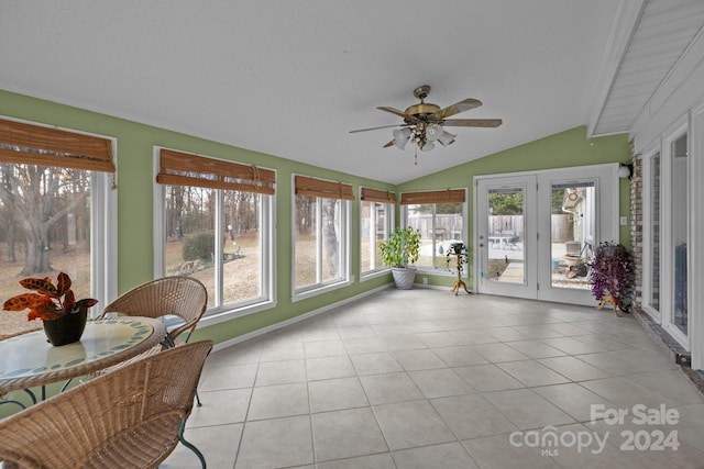 sunroom featuring ceiling fan and lofted ceiling