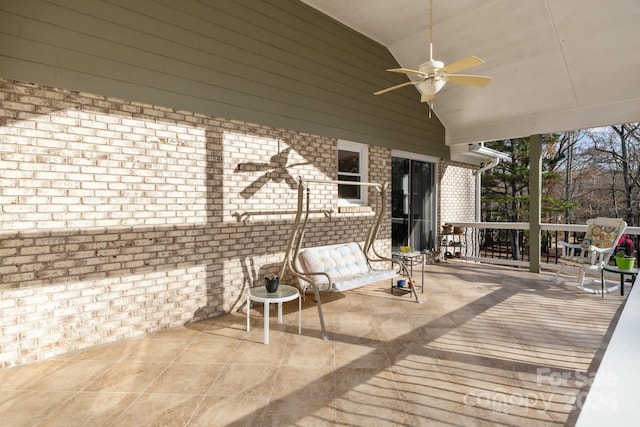 wooden terrace with ceiling fan