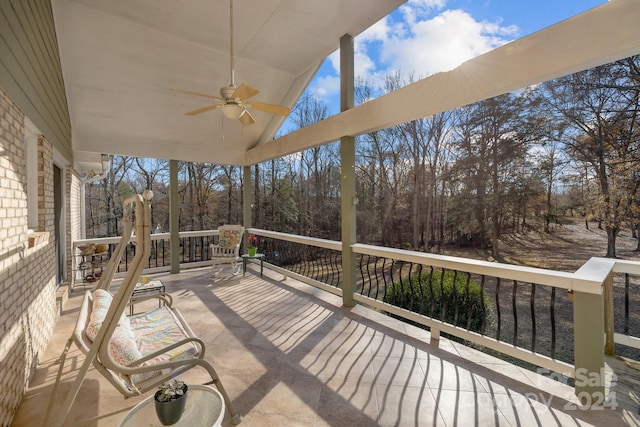 wooden deck with ceiling fan