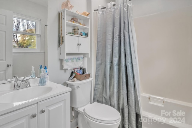 full bathroom featuring vanity, toilet, and shower / bath combo with shower curtain