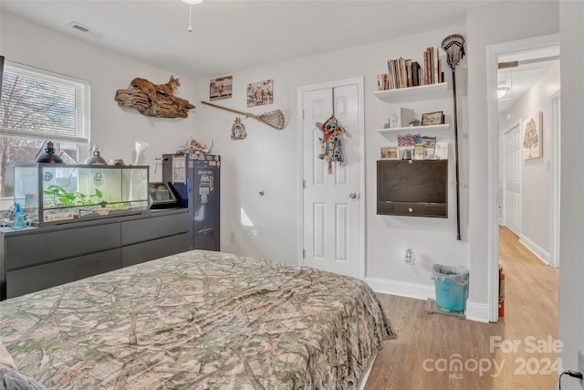 bedroom with light hardwood / wood-style flooring