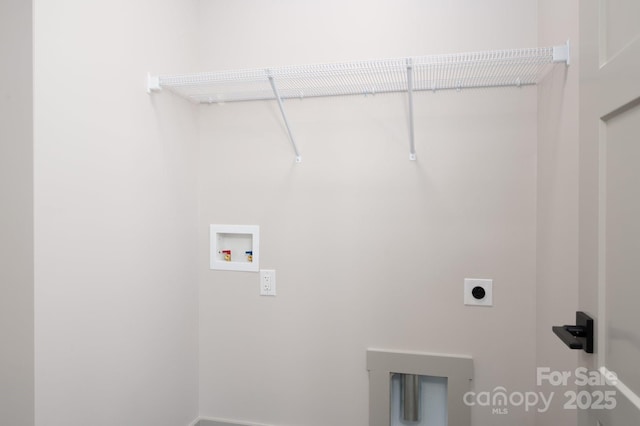 laundry room featuring hookup for an electric dryer and washer hookup