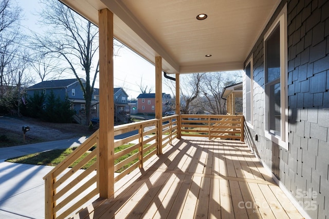 wooden terrace with covered porch