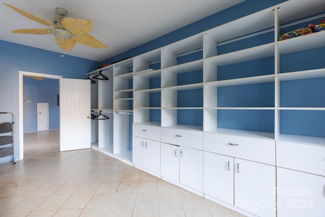 interior space featuring ceiling fan