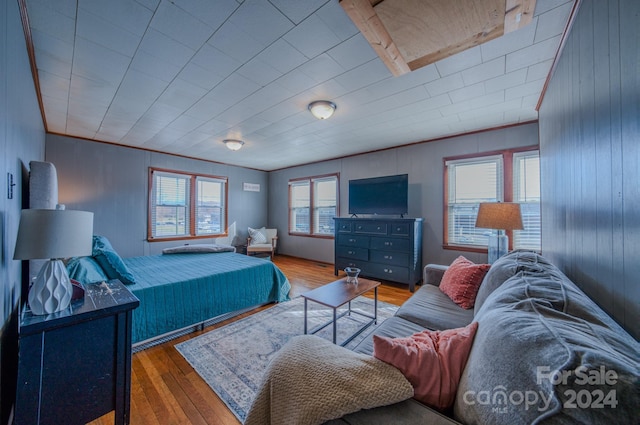 bedroom with hardwood / wood-style flooring