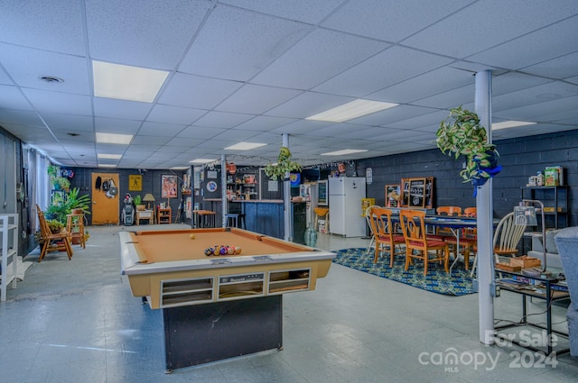 playroom with a paneled ceiling and pool table