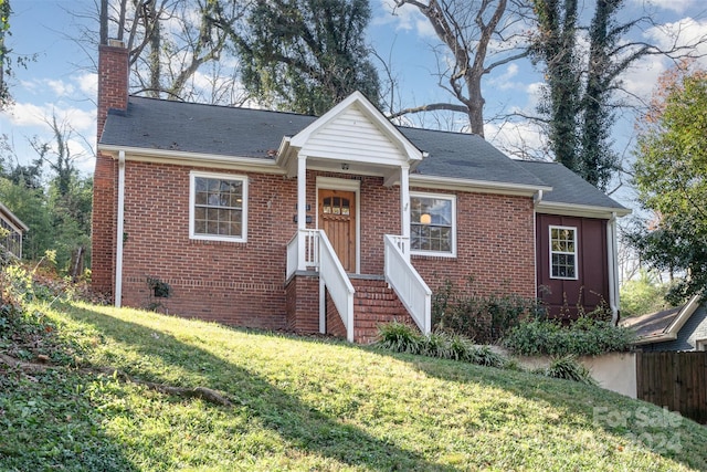 view of front of home with a front lawn