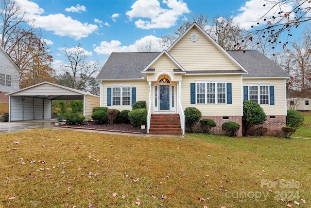 view of front of house with a front yard and a carport