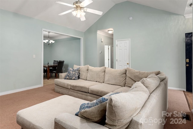 carpeted living room with ceiling fan with notable chandelier, high vaulted ceiling, and crown molding