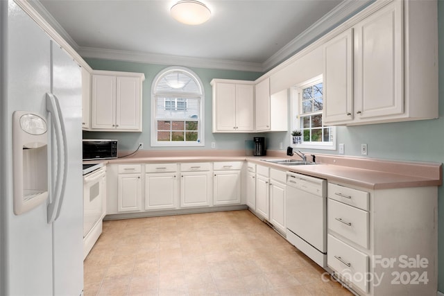 kitchen with white cabinetry, sink, white appliances, and ornamental molding