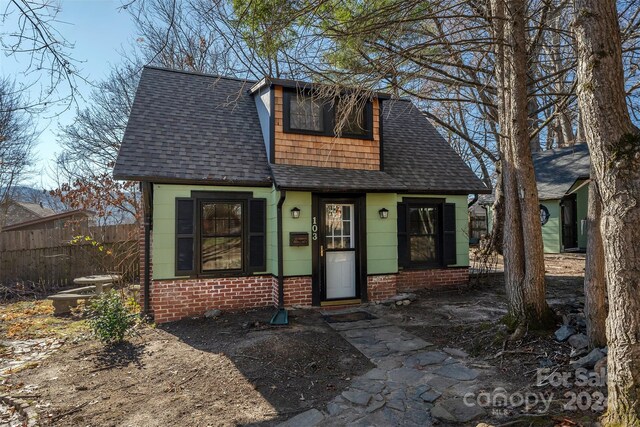 103 Pine St, Black Mountain, NC 28711 - view of front of property featuring brick siding and a shingled roof