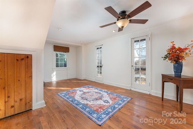 103 Pine St, Black Mountain, NC 28711 - entryway featuring wood finished floors, ceiling fan, and ornamental molding
