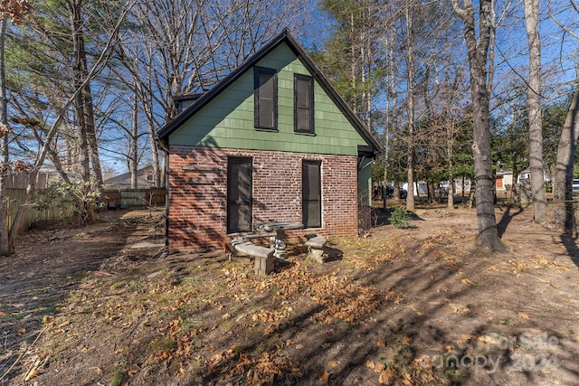 103 Pine St, Black Mountain, NC 28711 - view of side of home with brick siding