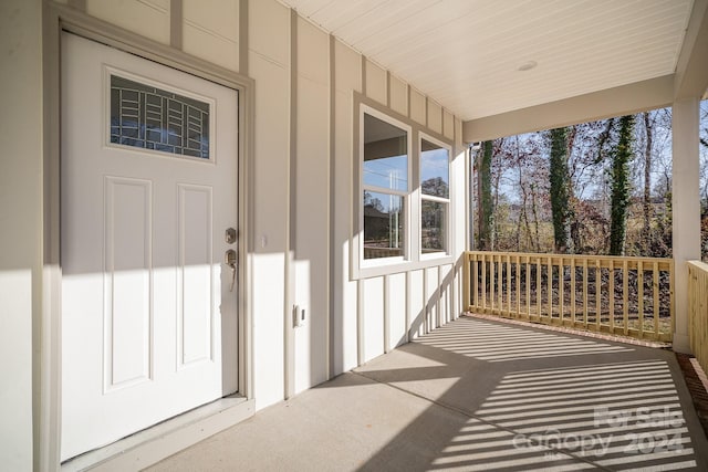 entrance to property with a porch