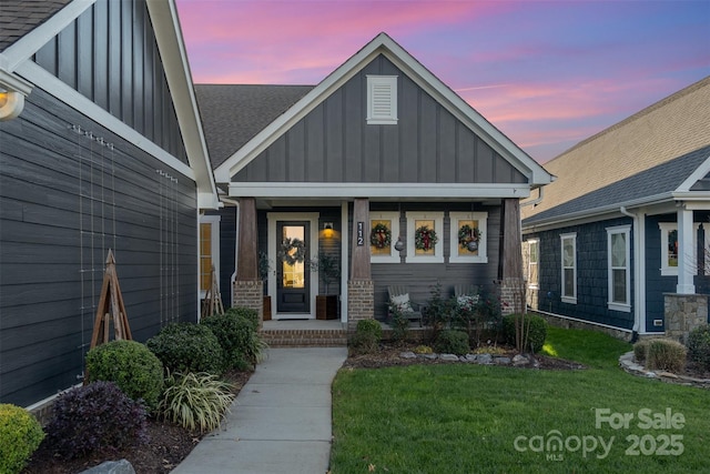 view of front of home with a lawn