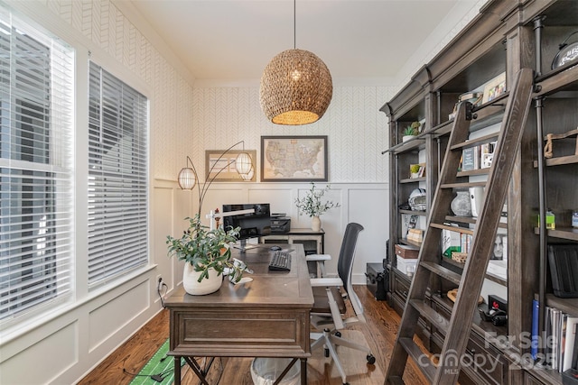 office area with crown molding and dark hardwood / wood-style flooring