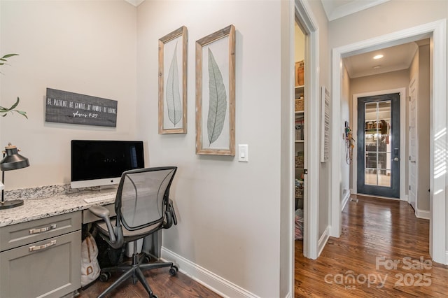 office with ornamental molding and dark hardwood / wood-style floors