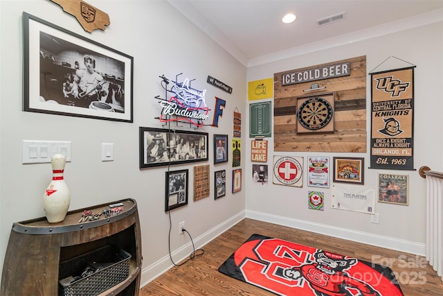 room details featuring hardwood / wood-style flooring and ornamental molding