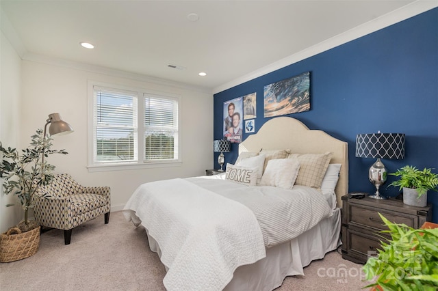 bedroom featuring ornamental molding and carpet floors