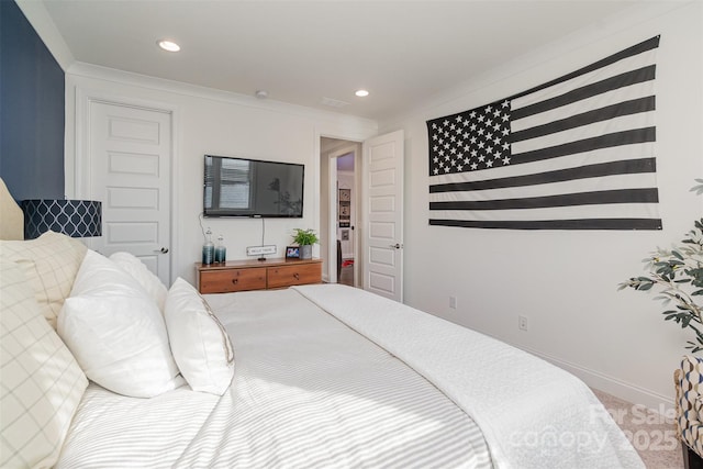 bedroom with ornamental molding