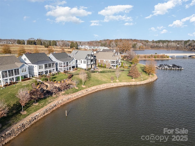 aerial view featuring a water view