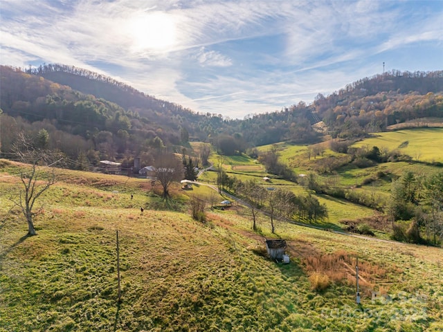 view of mountain feature featuring a rural view