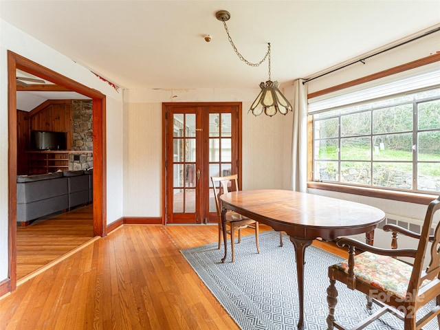 dining room with hardwood / wood-style flooring