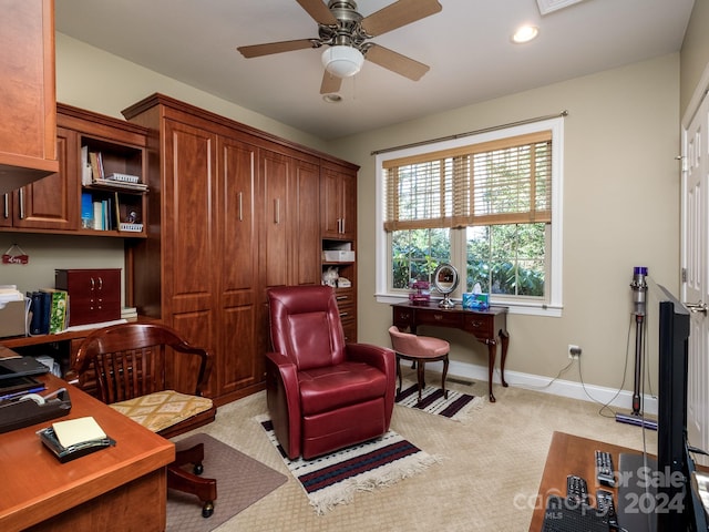 office with ceiling fan and light colored carpet