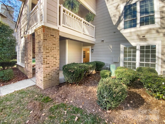 5003 Sharon Rd Unit S, Charlotte, NC 28210 - property entrance with a balcony and brick siding