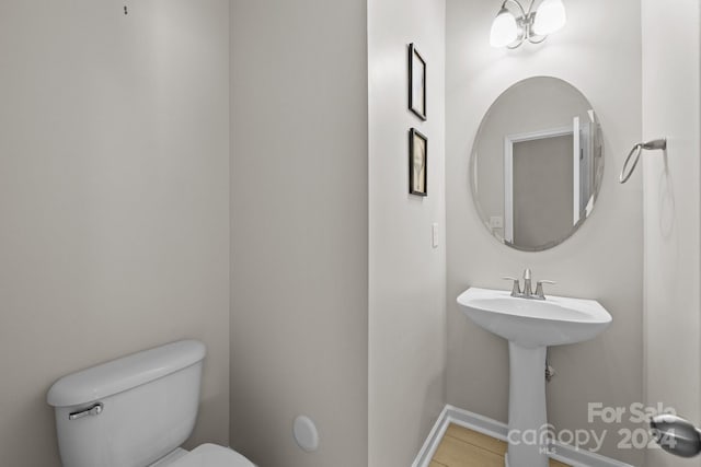 bathroom featuring tile patterned floors and toilet