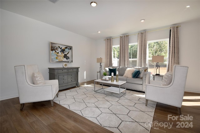 living room with light hardwood / wood-style flooring