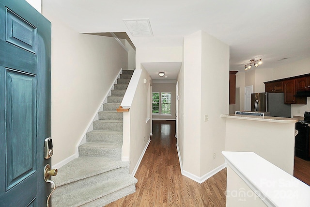 entrance foyer featuring light wood-type flooring