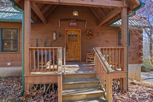 doorway to property with a porch