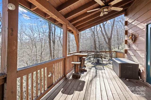 wooden deck featuring ceiling fan