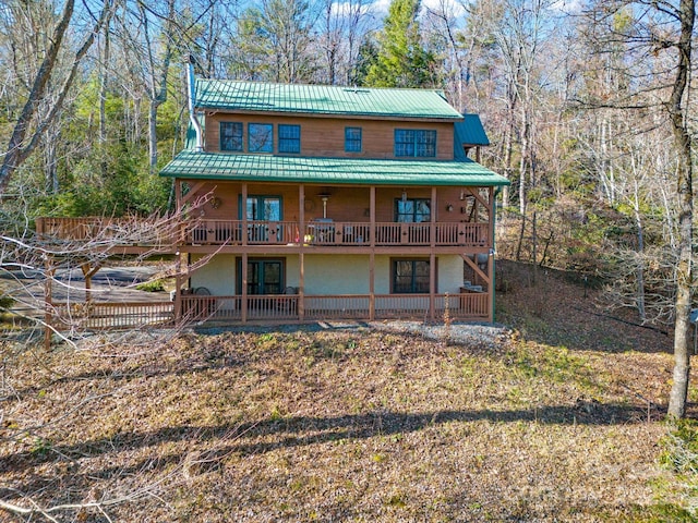 exterior space featuring a wooden deck