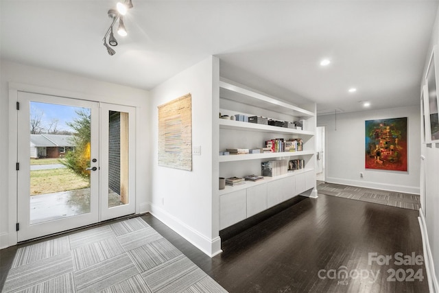 entrance foyer featuring dark wood-type flooring