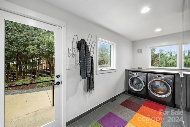 washroom featuring separate washer and dryer and plenty of natural light