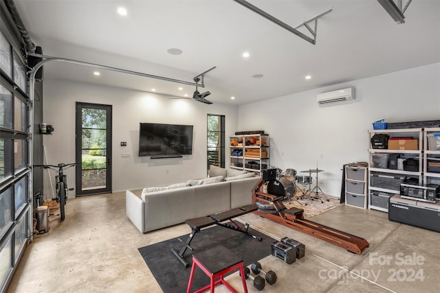 exercise room with a wall unit AC