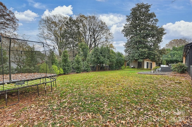 view of yard featuring a trampoline