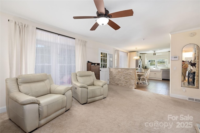 5431 Park Rd, Charlotte, NC 28209 - carpeted living room with visible vents and a ceiling fan