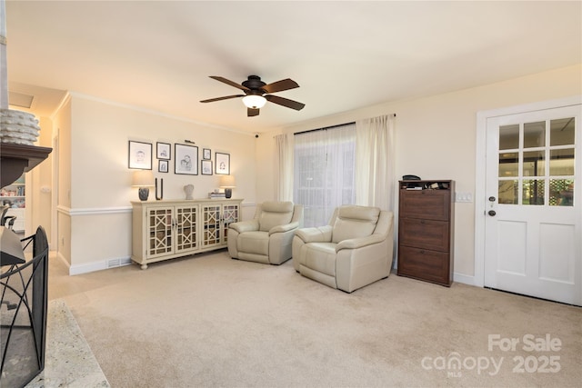 5431 Park Rd, Charlotte, NC 28209 - living area with baseboards, a ceiling fan, and carpet