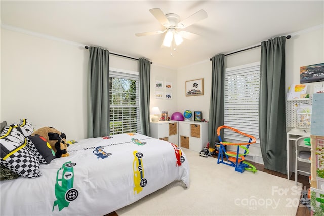 5431 Park Rd, Charlotte, NC 28209 - bedroom with crown molding, a ceiling fan, and carpet floors